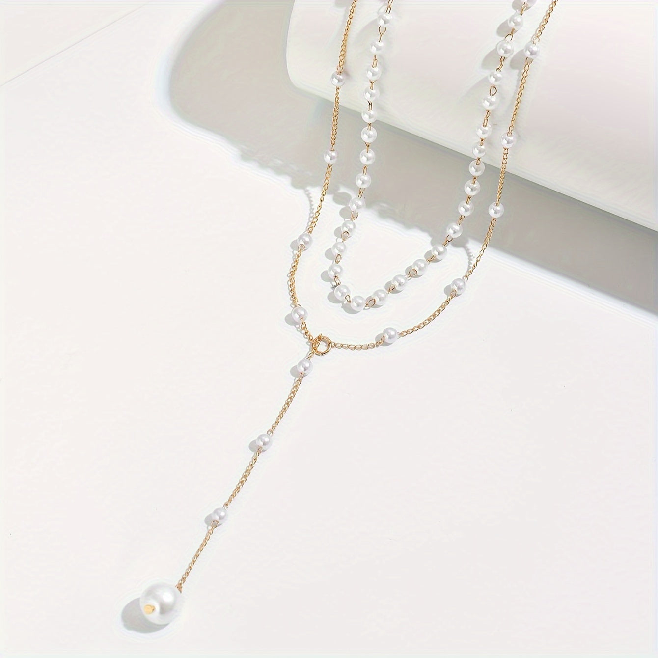 ELENA | Collar de perlas con diseño en Y